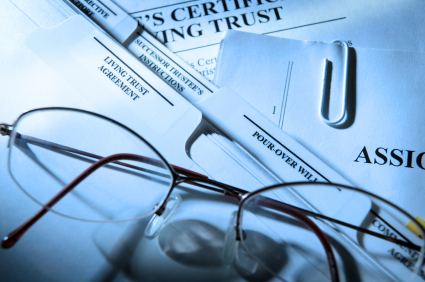 living trust documents with glasses